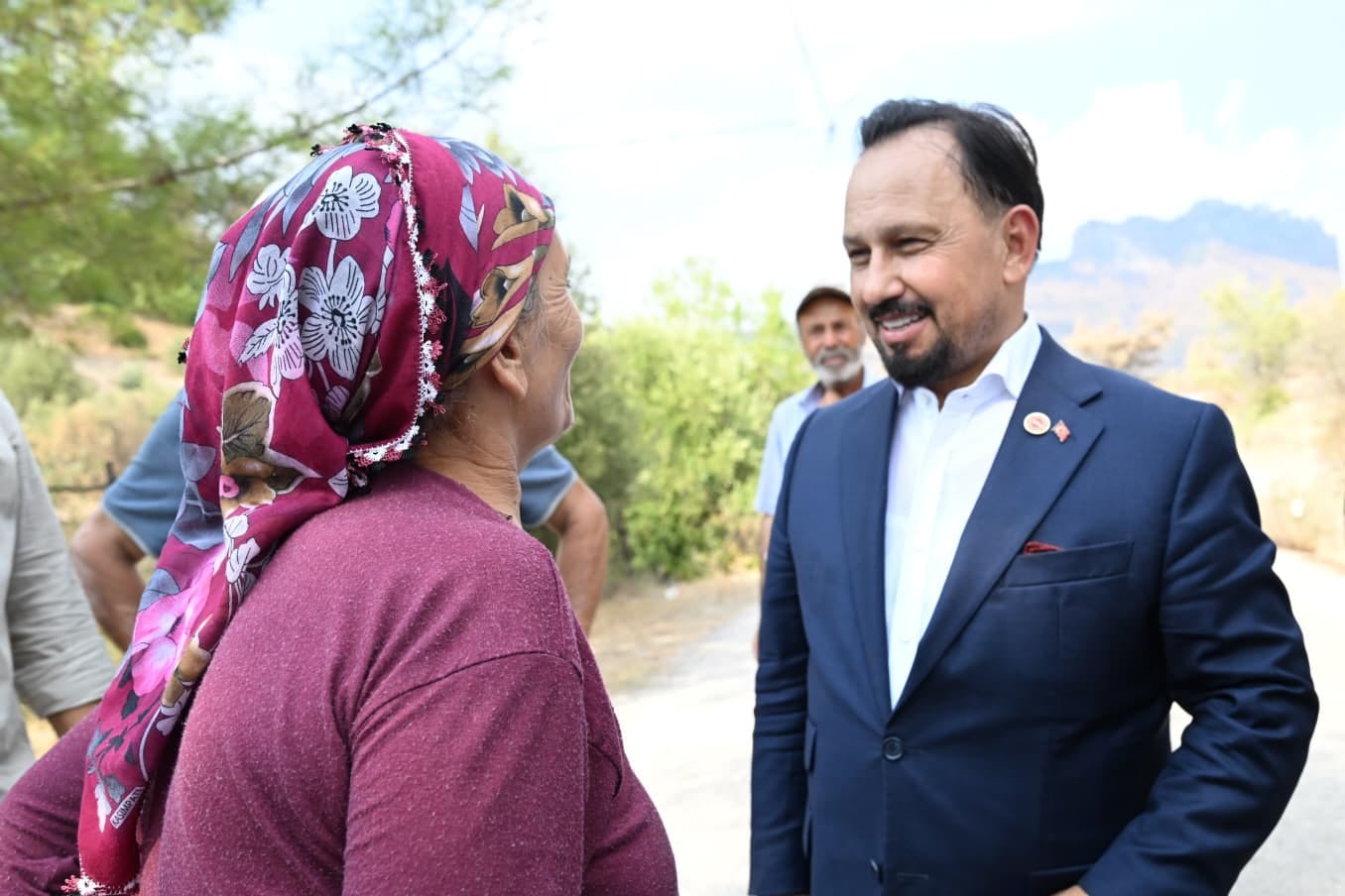 MHP’den yangın bölgesine çıkarma